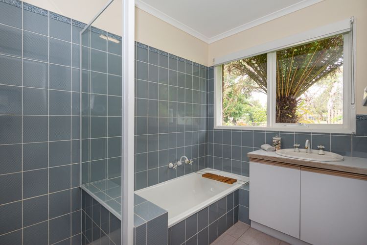 Bathroom with bath and shower 