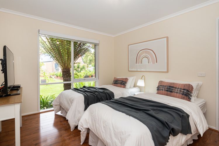 Bedroom four with two single beds 