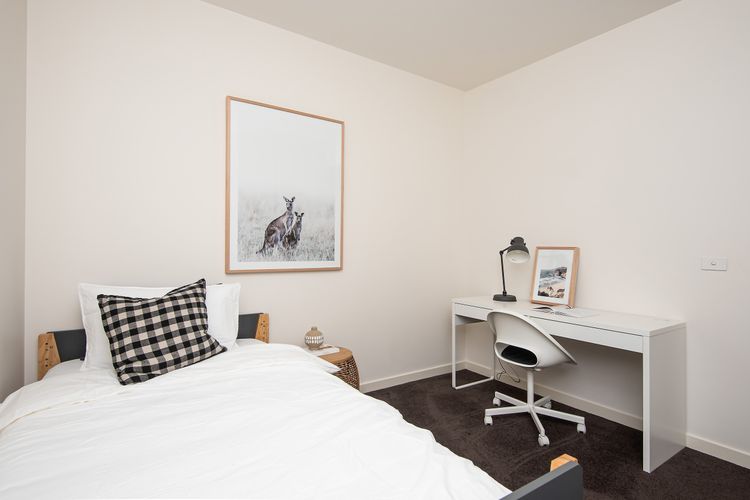 Bedroom 3 with king single bed and dedicated work space