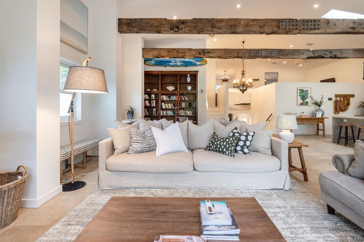 Step into our inviting living room, where warmth, comfort, and entertainment converge in perfect harmony.