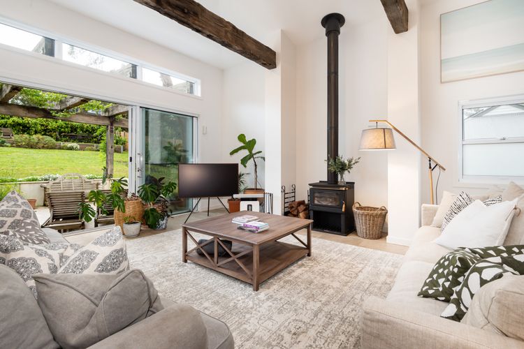 Gather around the fireplace on plush sofas with plush cushions. Sink into the comfortable seating as you bask in the flickering glow of the fire.
