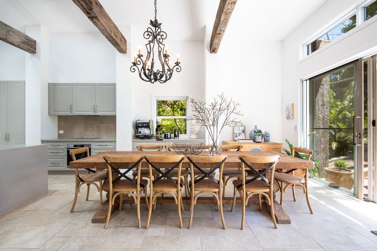 Crafted from rich, sturdy wood, this table is as beautiful as it is functional. Its generous size comfortably accommodates up to 10 guests.