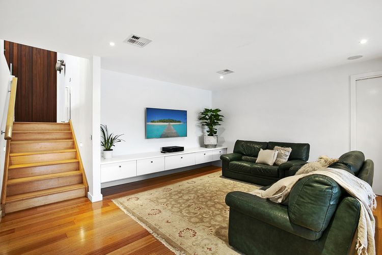 Second living space with a full sized billiard table and smart TV