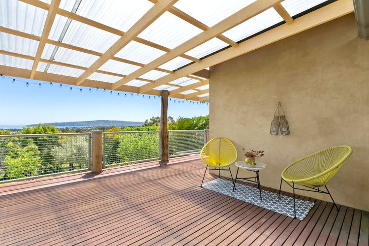 Large decking with outdoor dining and BBQ