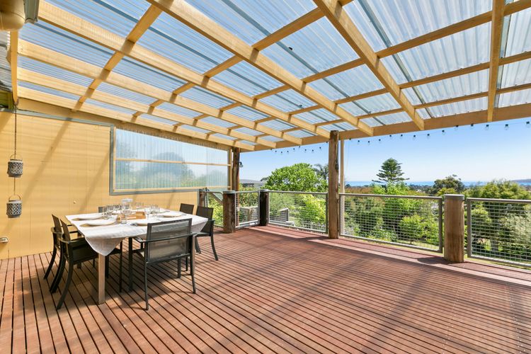 Large decking with outdoor dining and BBQ