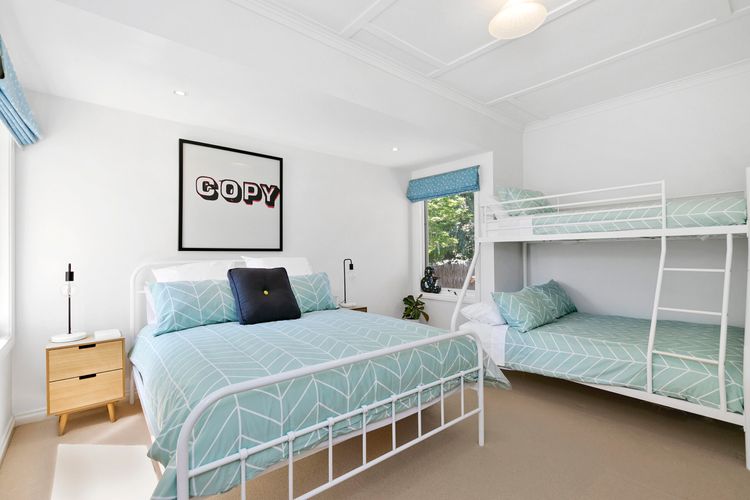 Bedroom two: Queen bed and double bunk with single above. Sleeping 5
