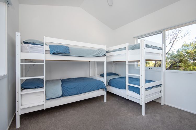 Downstairs bedroom with two single bunks