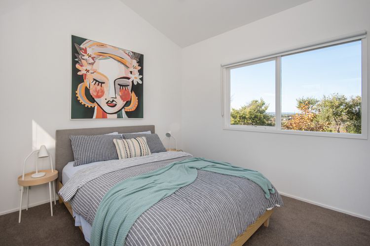 Downstairs bedroom with queen bed