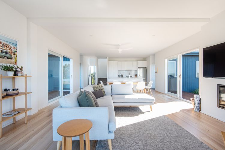 Main living, dining and kitchen and smart Tv and gas fireplace