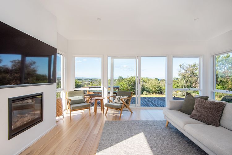 Main living with smart Tv and gas fireplace