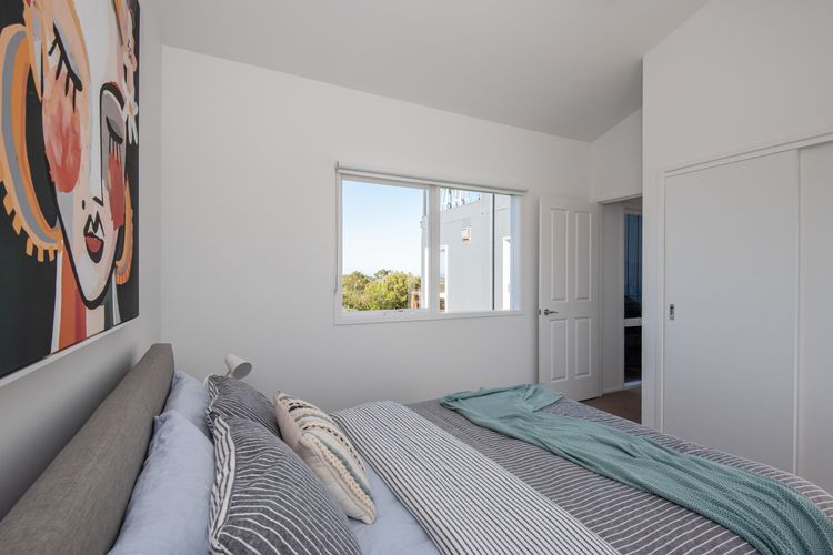 Downstairs bedroom with queen bed