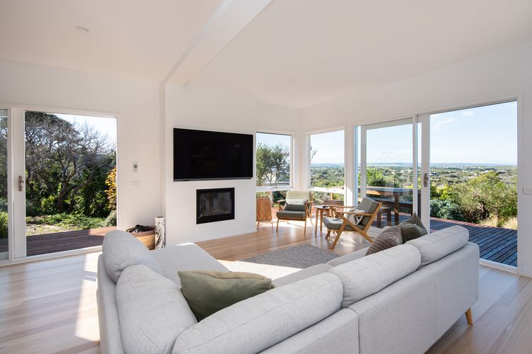 Main living with smart Tv and gas fireplace