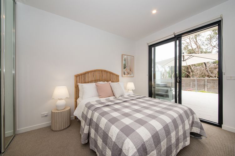Master bedroom with access to the patio. 