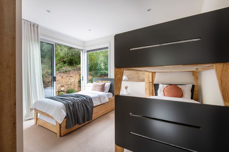 Sinlde bunk and single bed with a trundle 