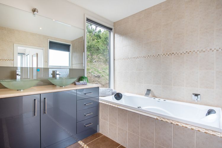 Main bathroom with bath and shower 