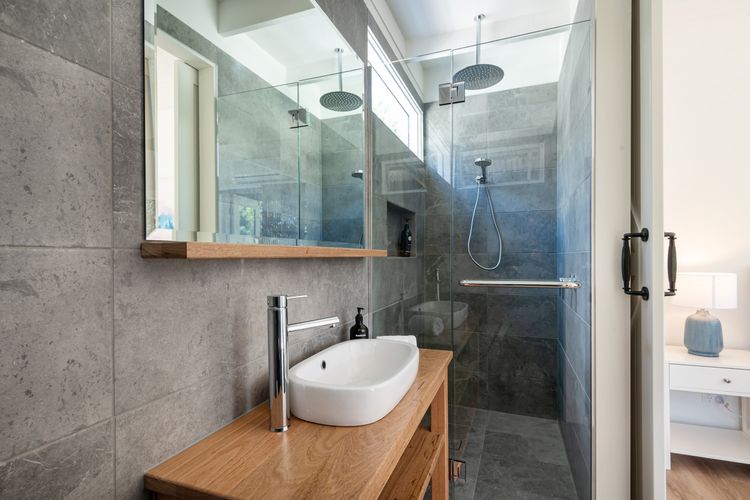 Ensuite bathroom with shower and toilet, attached to bedroom one
