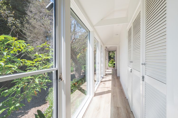 A hallway showing the outside garden