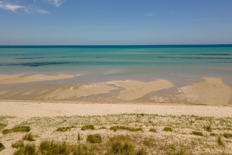 Two minute drive to the beach