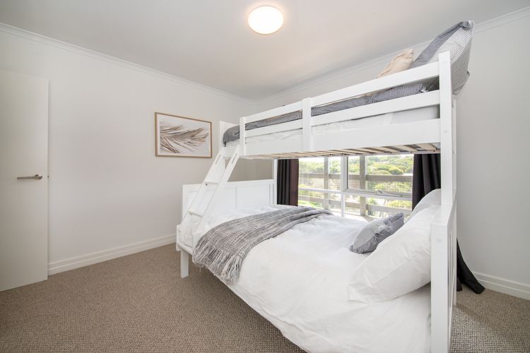 Bedroom 5 with double bunk and single above 