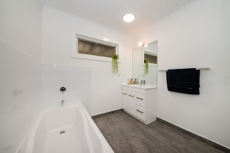 Bathroom with bath and shower 