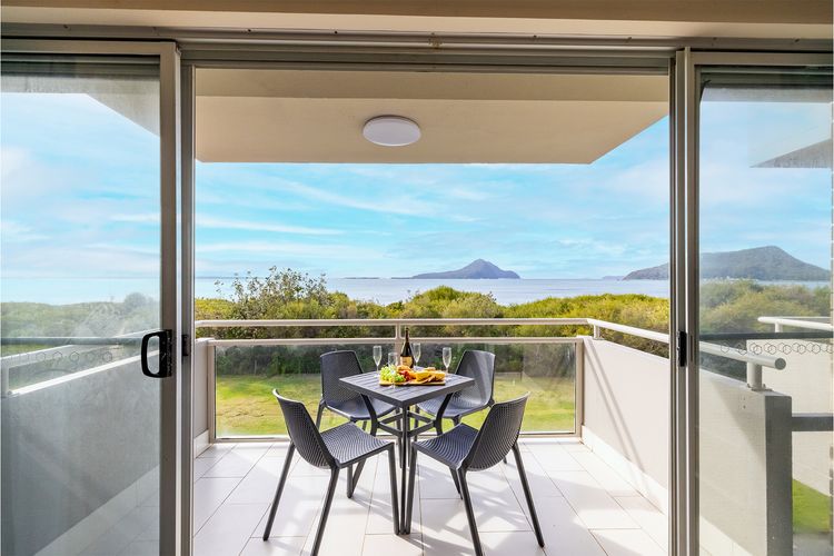 Ocean Shores, 7/27 Weatherly Cl – waterfront with fabulous views and WIFI