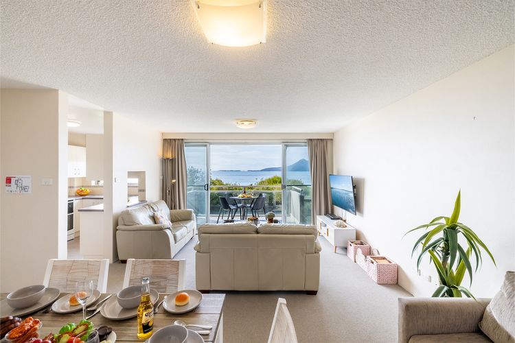 Ocean Shores, 7/27 Weatherly Cl – waterfront with fabulous views and WIFI