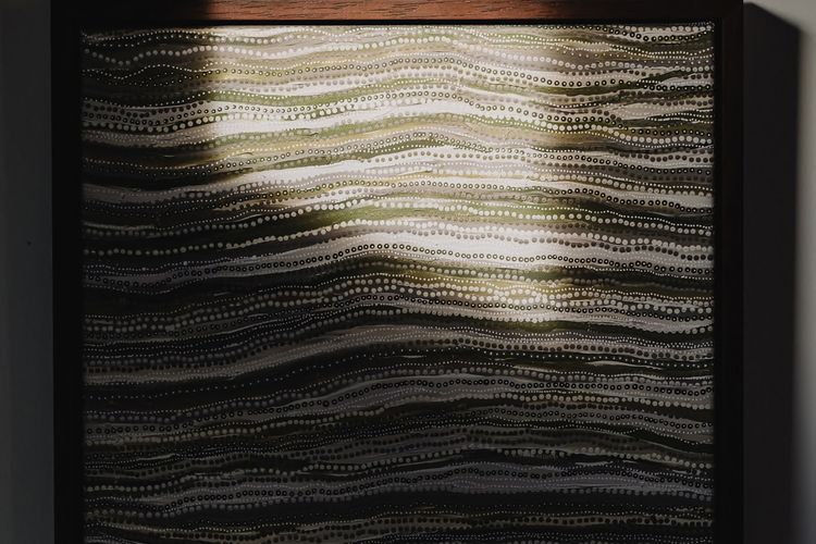 Considered aboriginal art - This piece reflects the layers of Country we walk on and the thousands of years of history that is below us.
A different coloured piece in each room.