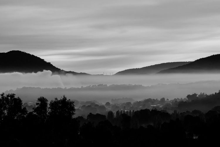 The morning mist waving through the valley, waiting for the sun to break through.