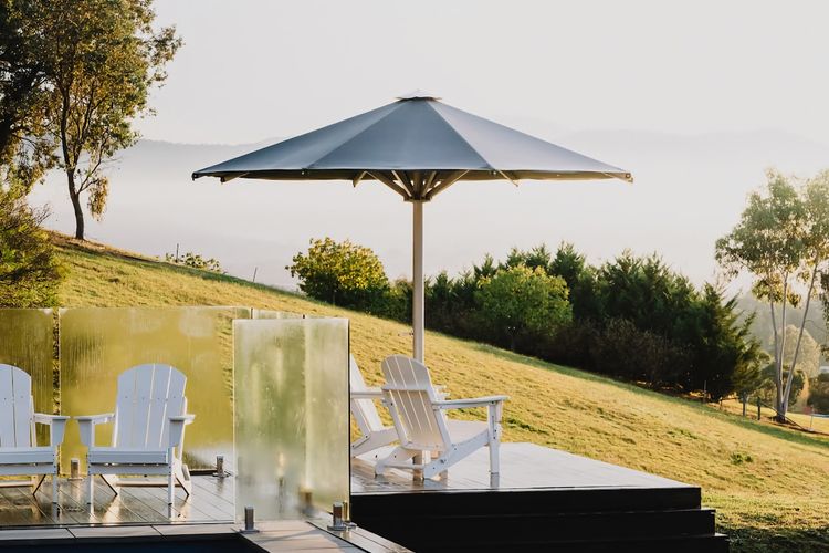 The viewing deck; enjoy a quiet afternoon enjoying a Scion wine or Reed & Co gin whilst taking in the Mount Buffalo view.
A hurricane proof umbrella in situ.