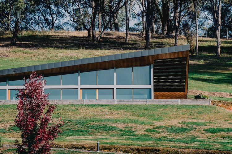 Expansive windows frame uninterrupted views across the valley.