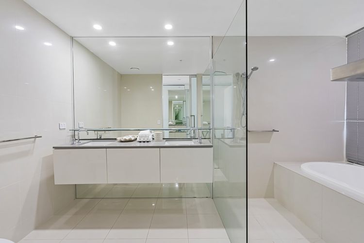 Luxurious bathroom 1 complete with a bath and a separate shower