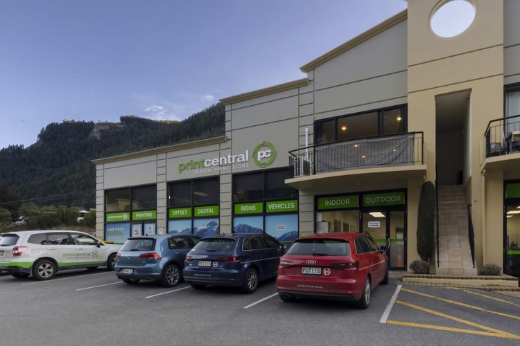 Apartment is located above Print Central