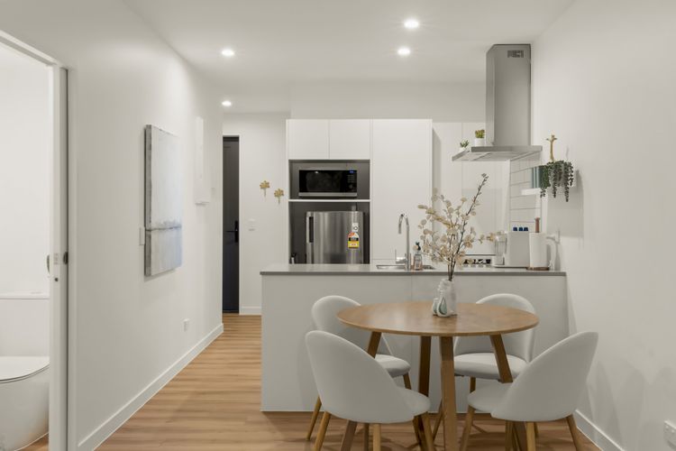 Dining and kitchen with guest powder room