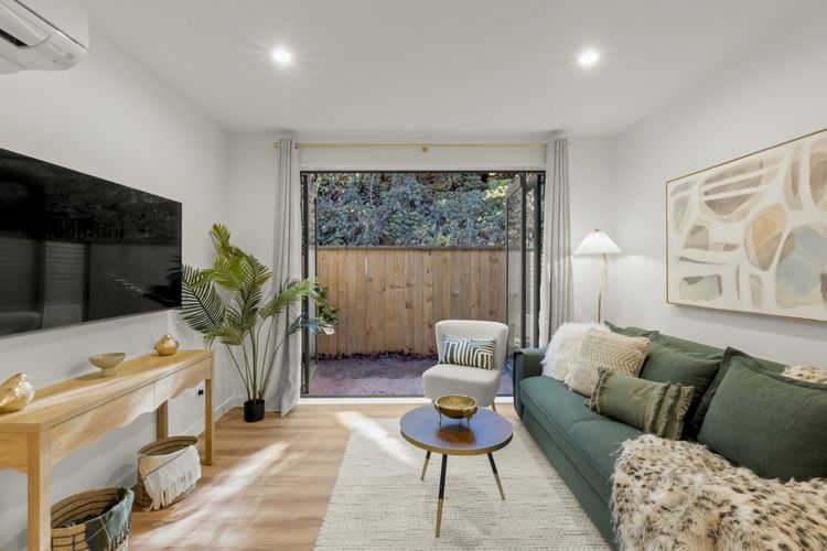 Private patio area with outdoor table and 2 chairs