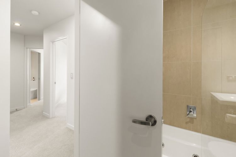 Family bathroom with shower over the bath