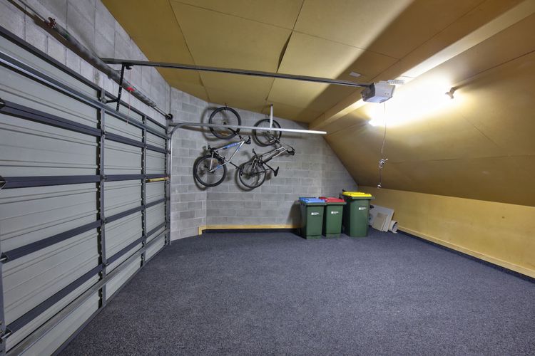 Large double garage for mountain bikes, skis and car parking