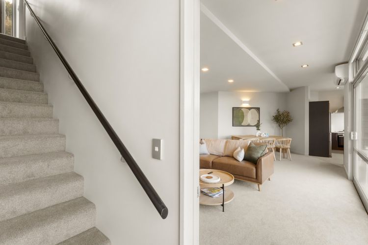 Entrance, stairs into living room