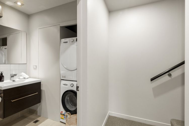 Full laundry inside master bathroom (shower over the bath)