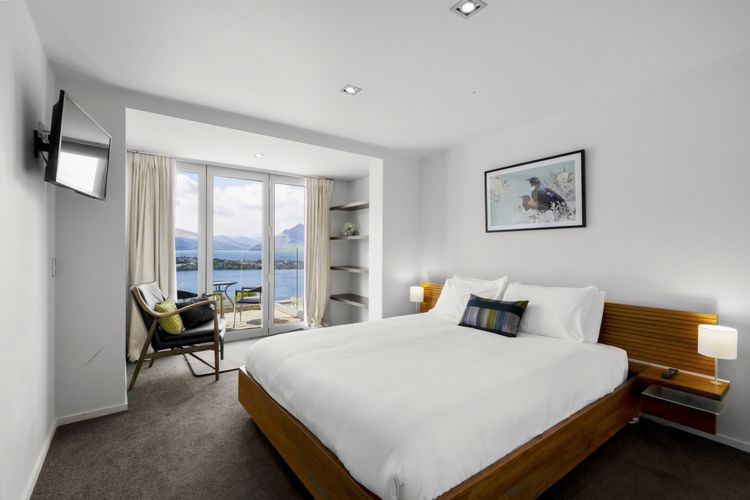 Bedroom 3 - Queen bed and private patio area