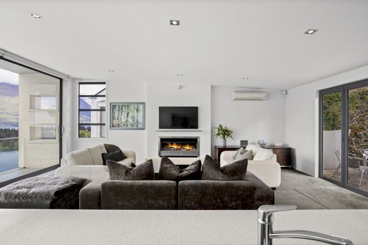 Living Room with Gas Fireplace and heatpump/aircon