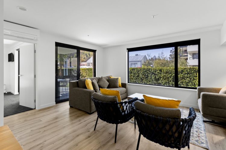 Spacious living area with aircon in the living room