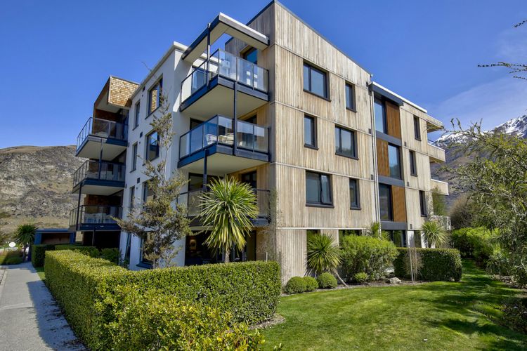 Ground floor corner apartment with private patio