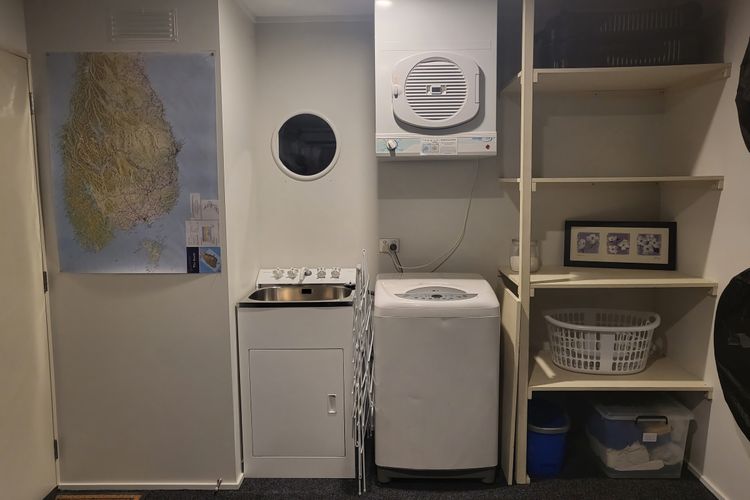 full laundry with washer and dryer