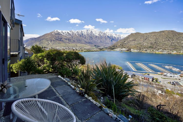 Ground floor patio accessed from lower bedrooms