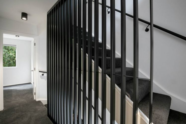 Bedroom at each end of the stairwell