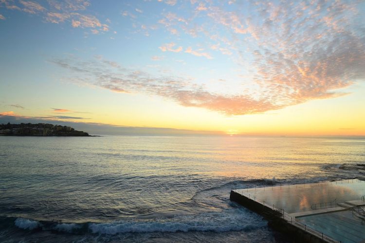Start your mornings with a sunrise swim at world-famous Bondi Beach.