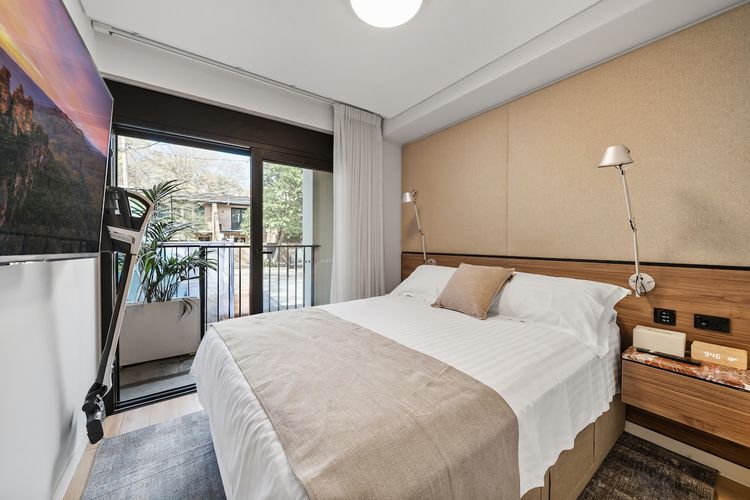 Sleep soundly on a cozy queen-sized bed with fresh linens.