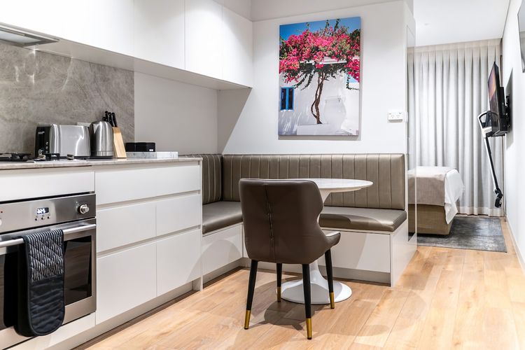 Enjoy meals or morning coffee in your private dining corner.
