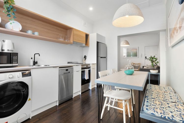 This charming kitchen area is designed for relaxation and connection, making it the heart of your home away from home.
