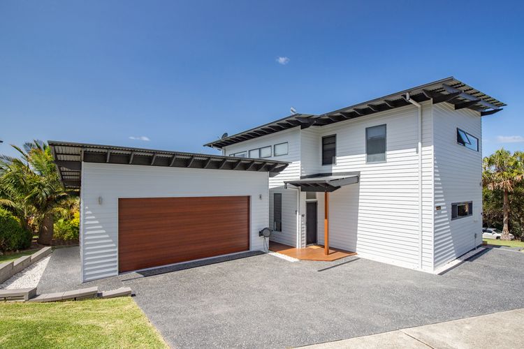 House Exterior with Driveway and Garage